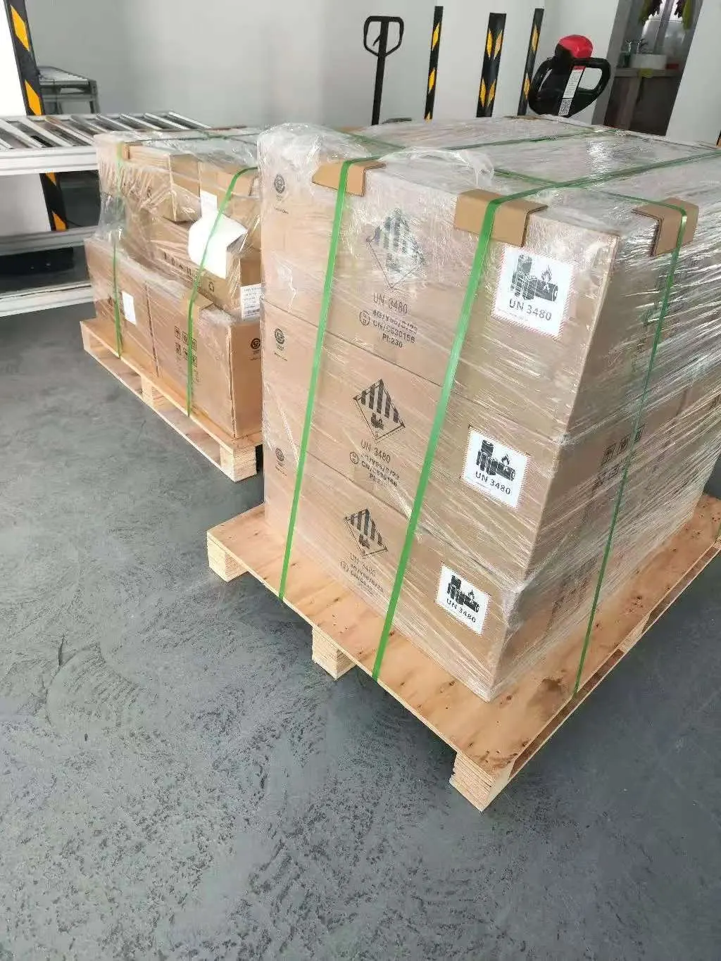 Palletized shipment with UN3480 lithium battery hazard labeling, strapped and corner-protected, ready for export from our Shenzhen facility